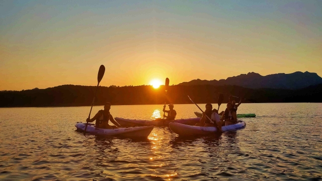 Kayaking in Sardinia at sunset - Tour of the Biderosa coast